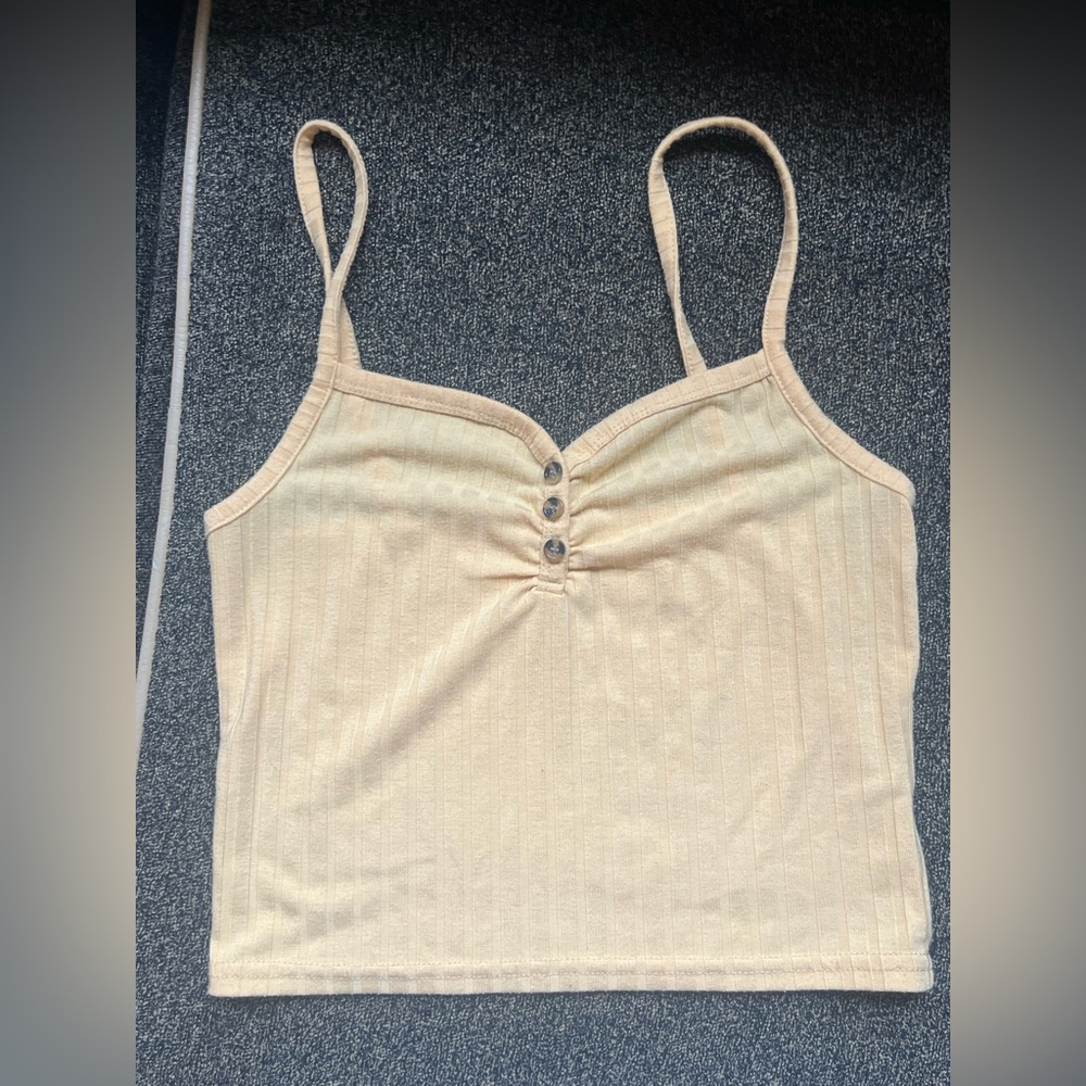 Yellow Tilly’s cropped tank top
